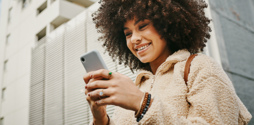 A credit union member viewing her lending options on her mobile device.