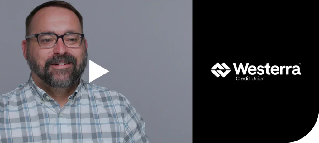 A play button overlayed over a photo of Mike Grabast / Westerra Credit Union