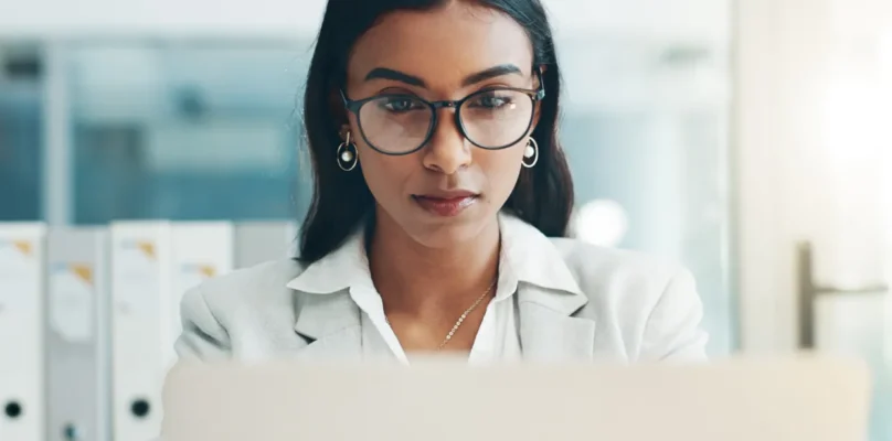 An executive leader reviewing the credit union lending automation workflows.